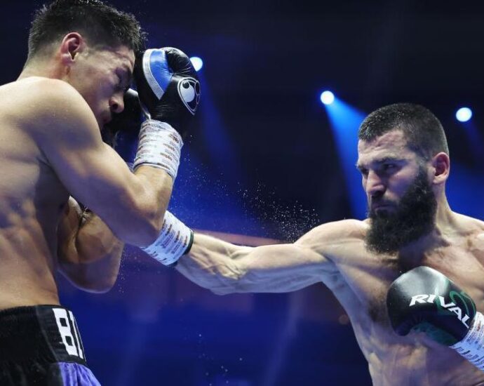 Beterbiev edges Bivol to become undisputed champion