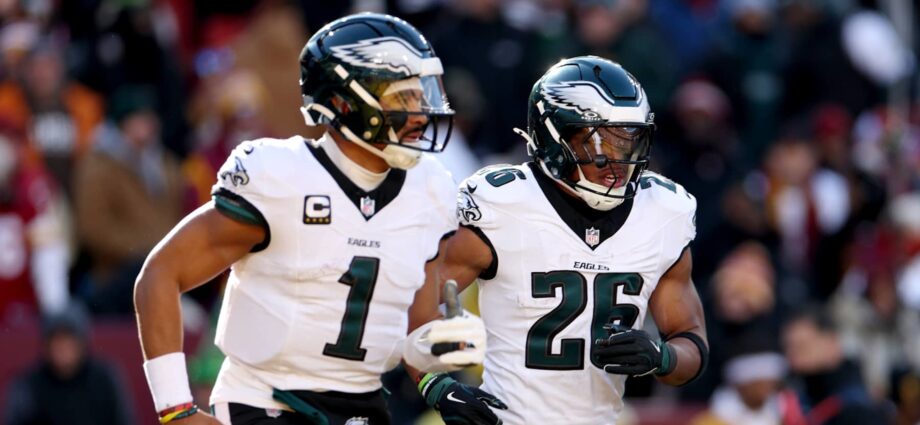 Photo: Jalen Hurts, Saquon Barkley Gift Eagles OL Custom Golf Carts for Holidays