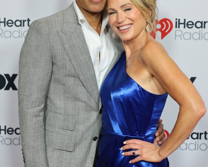 Amy Robach and T.J. Holmes spark engagement rumors as she flashes huge ring at iHeartRadio Music Awards 2025