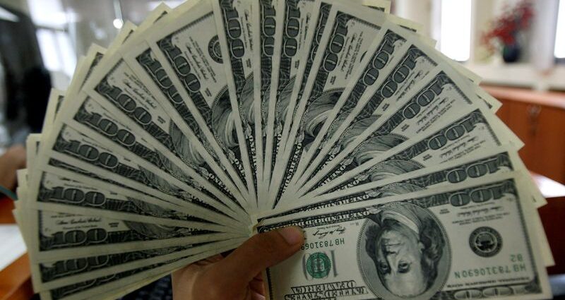 Dollar falls broadly ahead of US data, tariff uncertainty