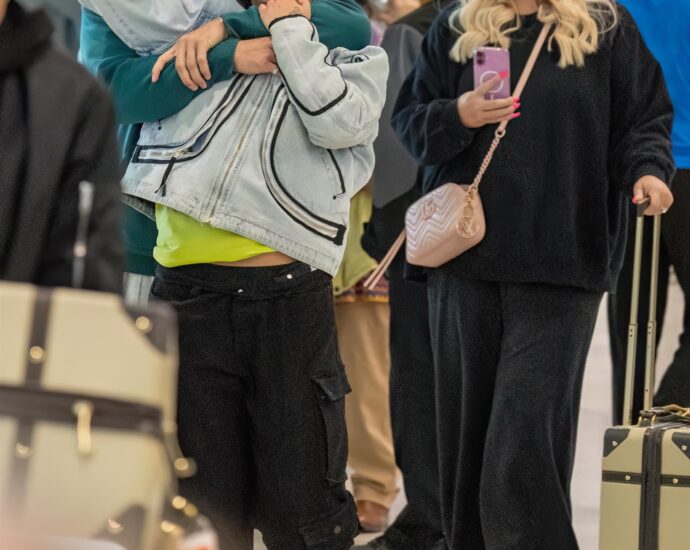 JoJo Siwa and Chris Hughes have affectionate reunion in London after confirming romance with a kiss
