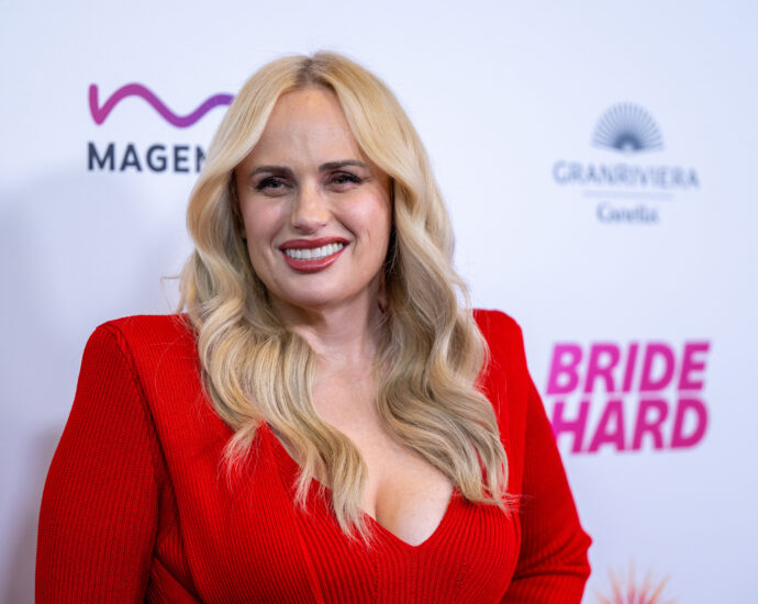 Rebel Wilson on Working With Robert Pattinson’s ‘Batman’ Stunt Coordinators on ‘Bride Hard’ And Wanting ‘Fat Amy’ to Get Married in ‘Pitch Perfect 4’