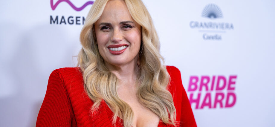 Rebel Wilson on Working With Robert Pattinson’s ‘Batman’ Stunt Coordinators on ‘Bride Hard’ And Wanting ‘Fat Amy’ to Get Married in ‘Pitch Perfect 4’