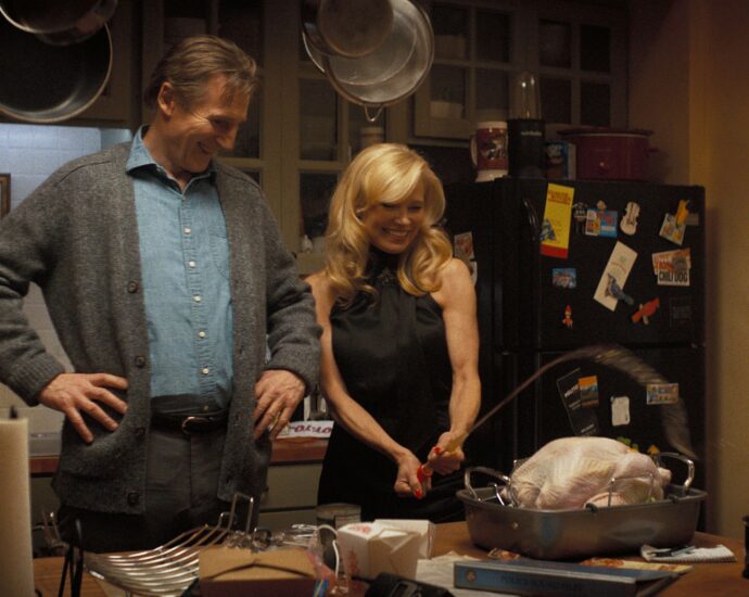 Liam Neeson and Pamela Anderson Make Beautifully Dumb Music in ‘The Naked Gun’