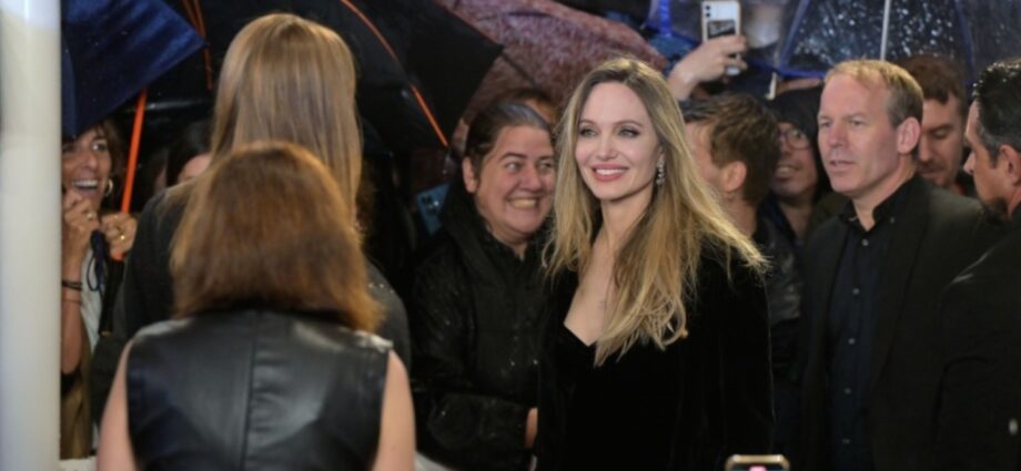 Angelina Jolie, Louis Garrel Brave Torrential Rain in San Sebastian for European Premiere of Alice Winocour’s ‘Couture’