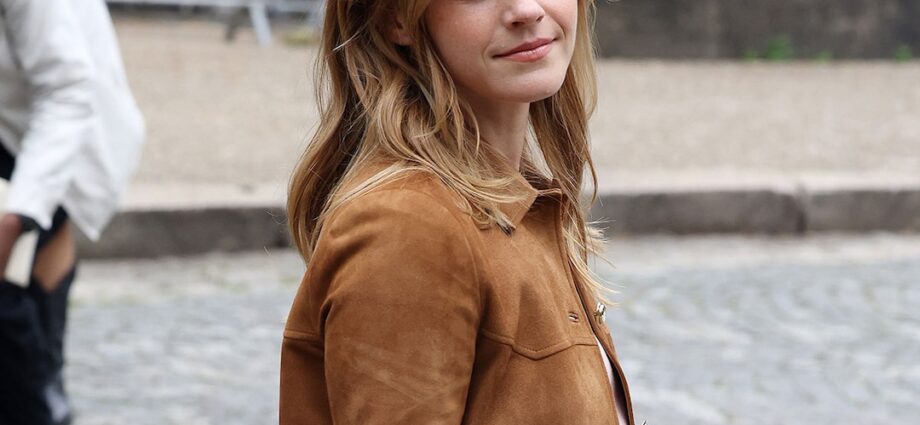 Emma Watson Riding Motorcycle at Paris Fashion Week