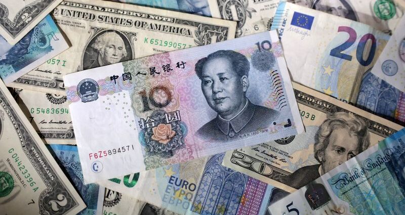 Dollar hits two-week high against yen as trade talks, Fed meeting loom