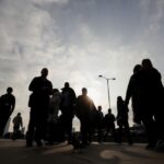 UK employers report weaker hiring but stronger pay growth in December