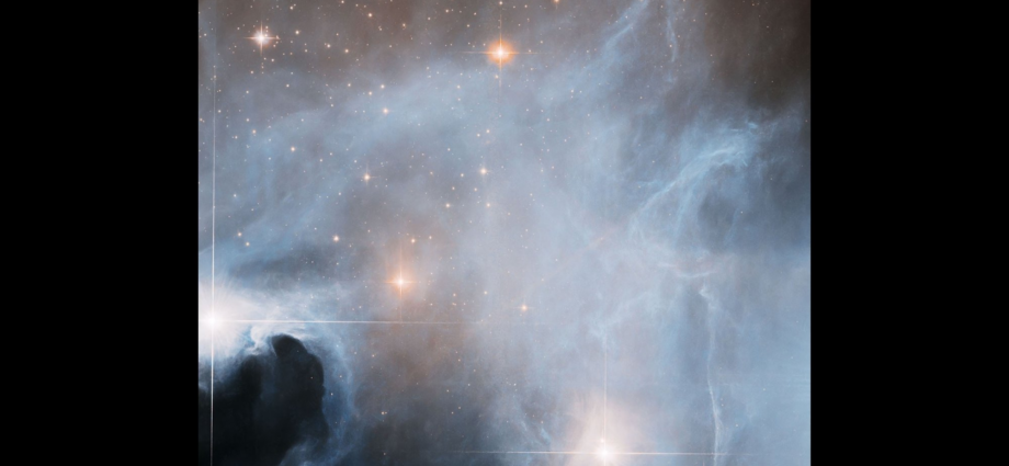 Hubble spots three young stars going through growth spurts