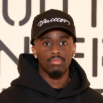 Kai Cenat Pulled Up To Paris Fashion Week With His Vivet Journal In Hand