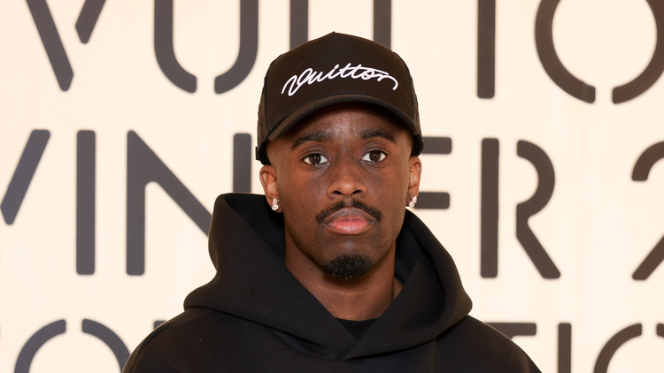 Kai Cenat Pulled Up To Paris Fashion Week With His Vivet Journal In Hand