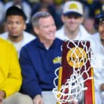 May agrees to new deal, Michigan AD Manuel says