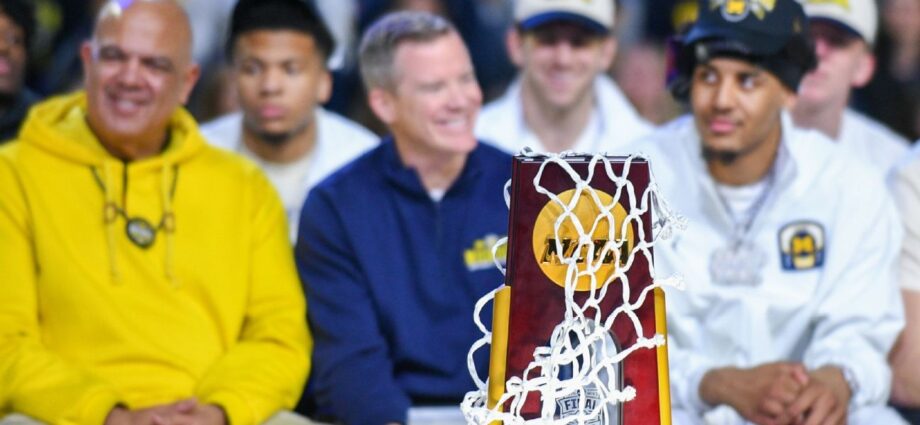 May agrees to new deal, Michigan AD Manuel says