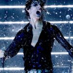 Sombr Sings Aching ‘Homewrecker’ Hit in a Rainstorm During AMAs Performance